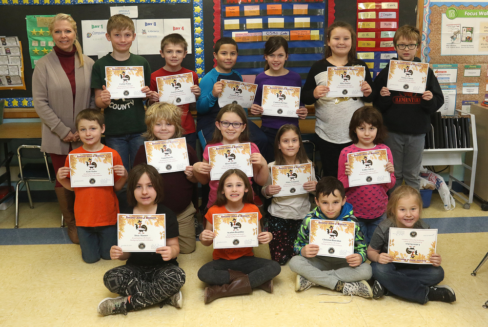Third-grade class receives certificates for taking part in writing celebration