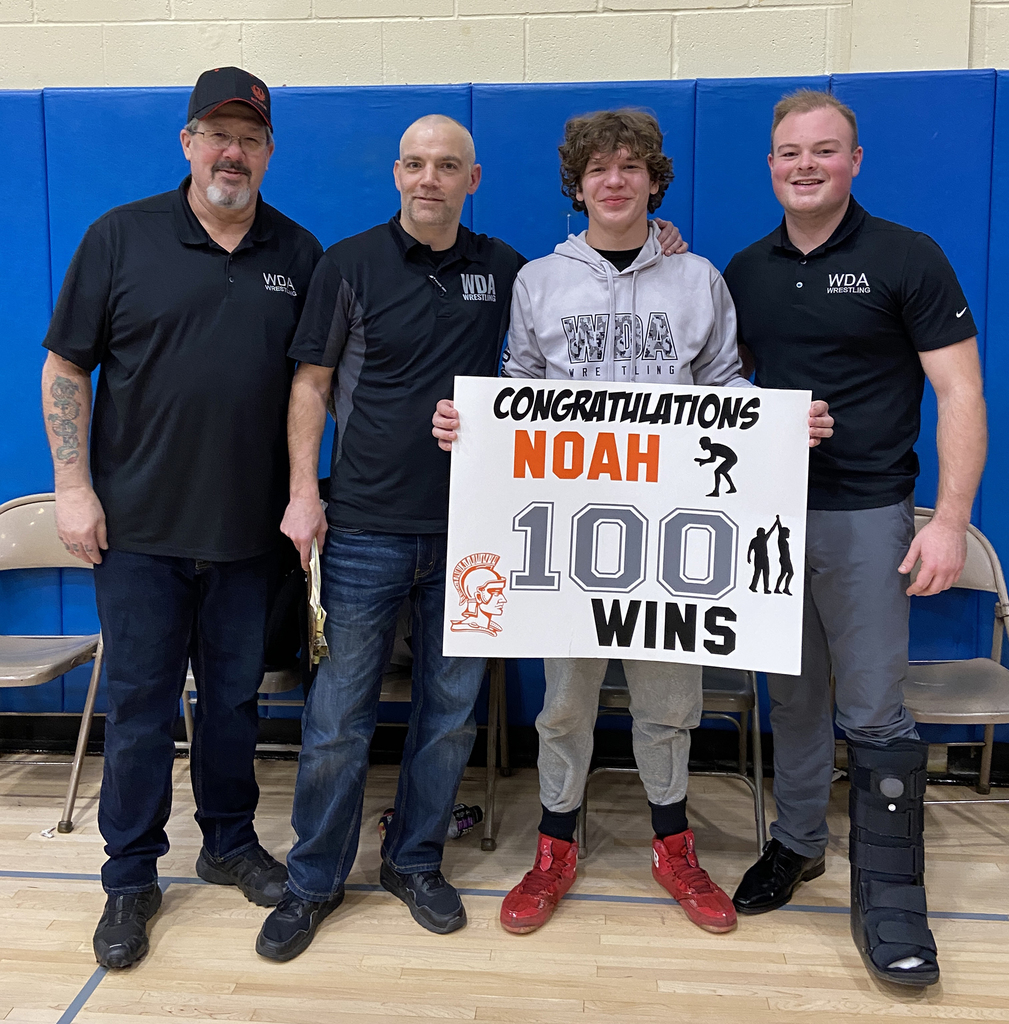 Noah Sovocool with his coaches