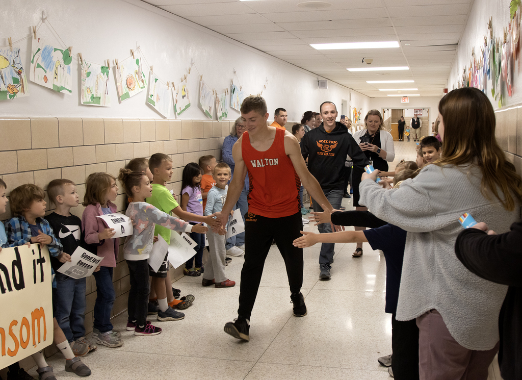Ransom Dutcher walks through Townsend Elementary